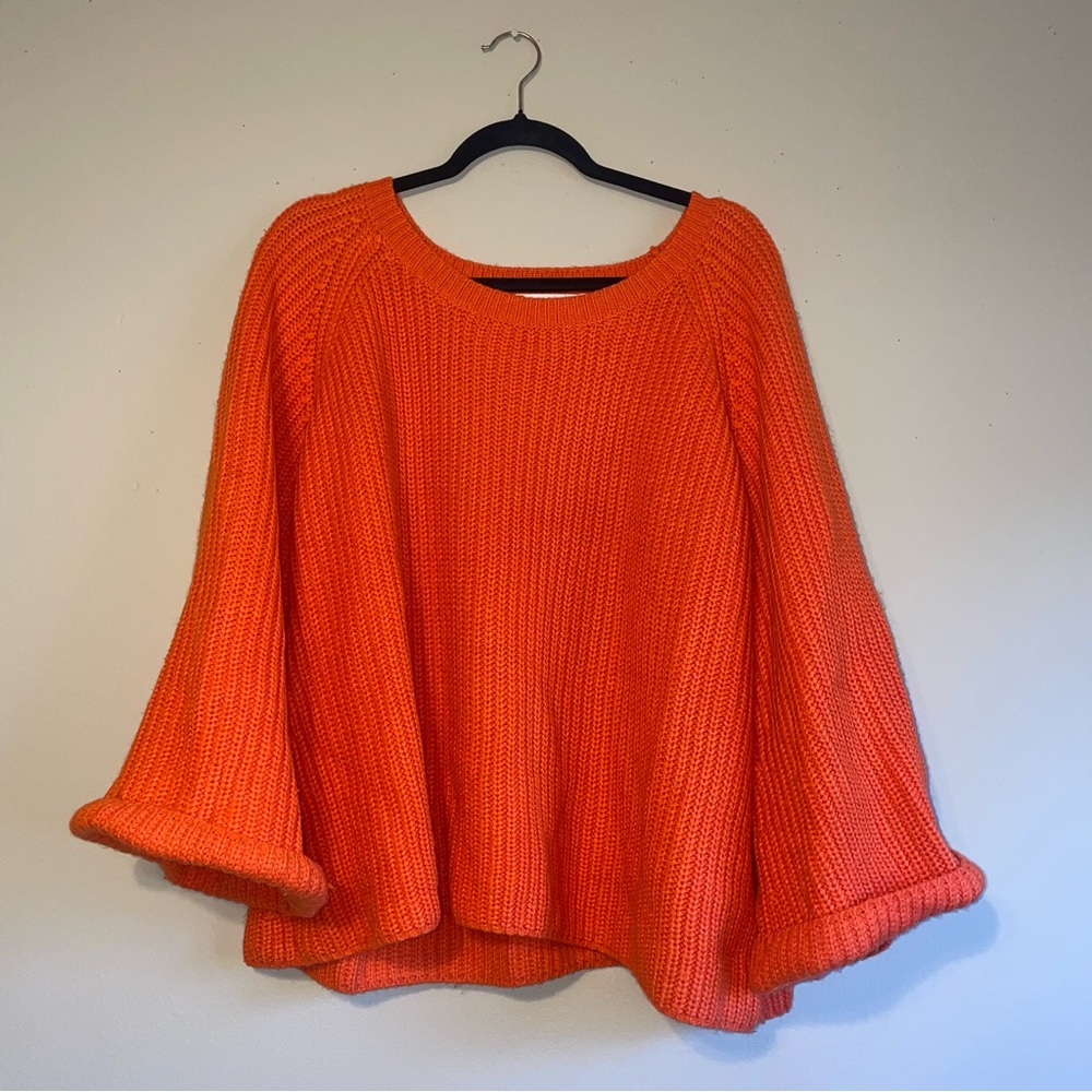 Oversized sweater with bell sleeves